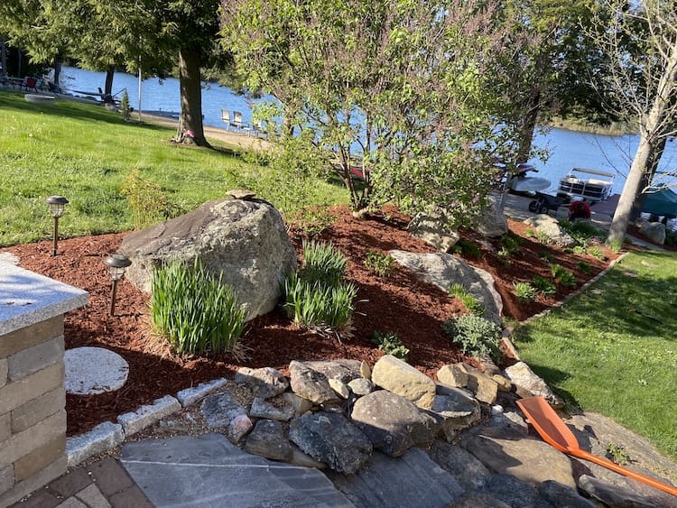 Nicely kept rock garden with fresh mulch